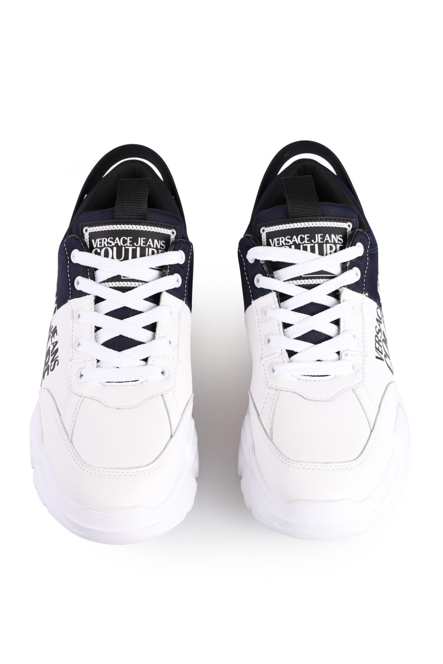 Zapatillas "Speedtrack" de color blanco y azul - IMG 1030