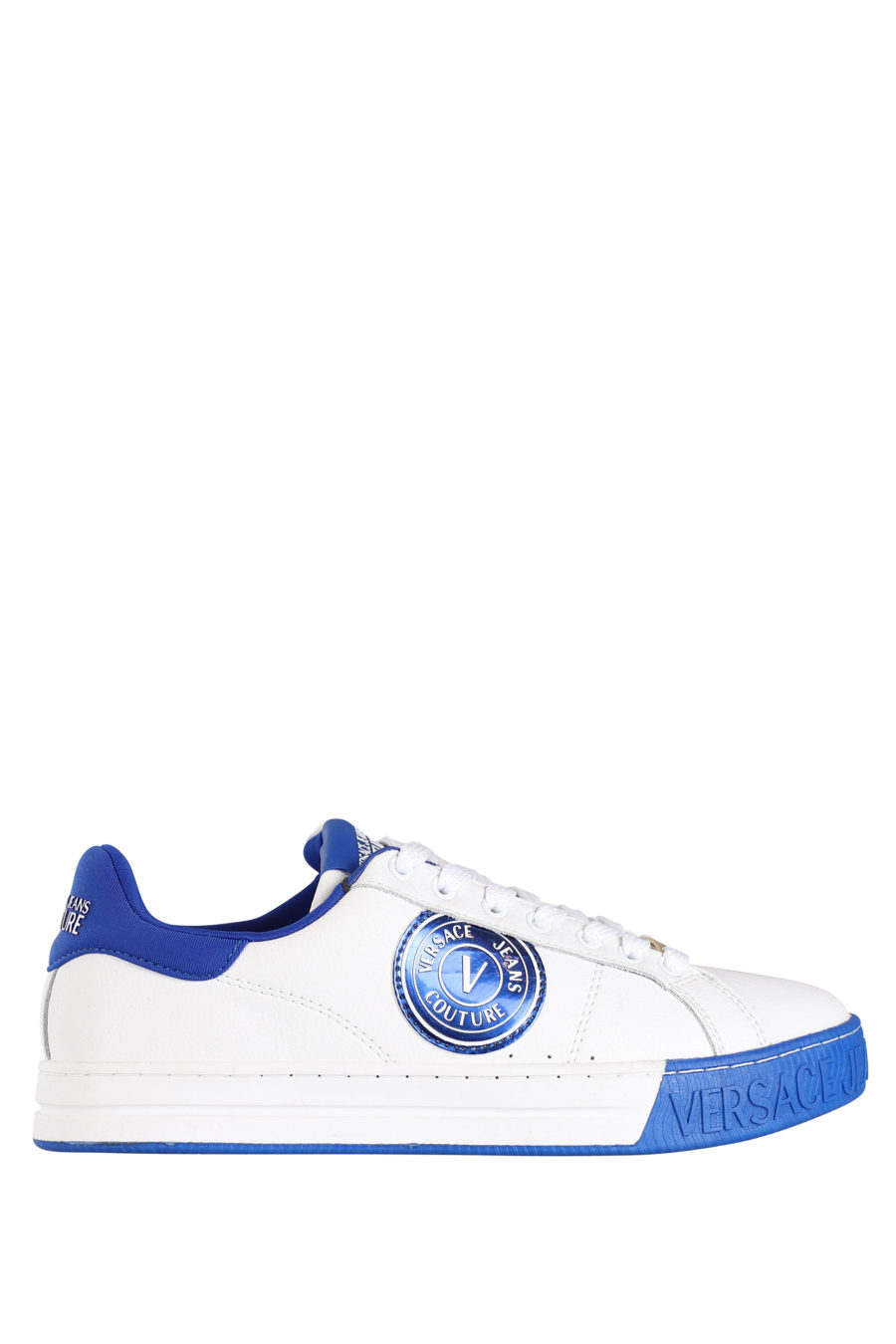 Zapatillas blancas con detalles azul - IMG 9800