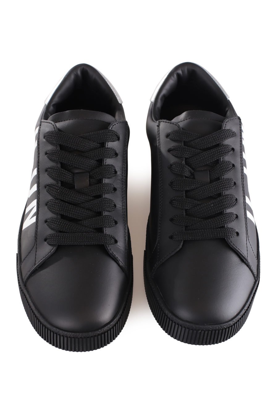 Black trainers with diagonal "icon" logo and silver detail - IMG 9598