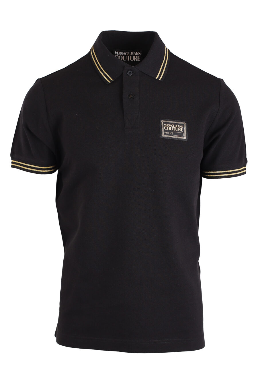 Schwarzes Poloshirt mit goldenen Streifen und Logostempel - IMG 4156