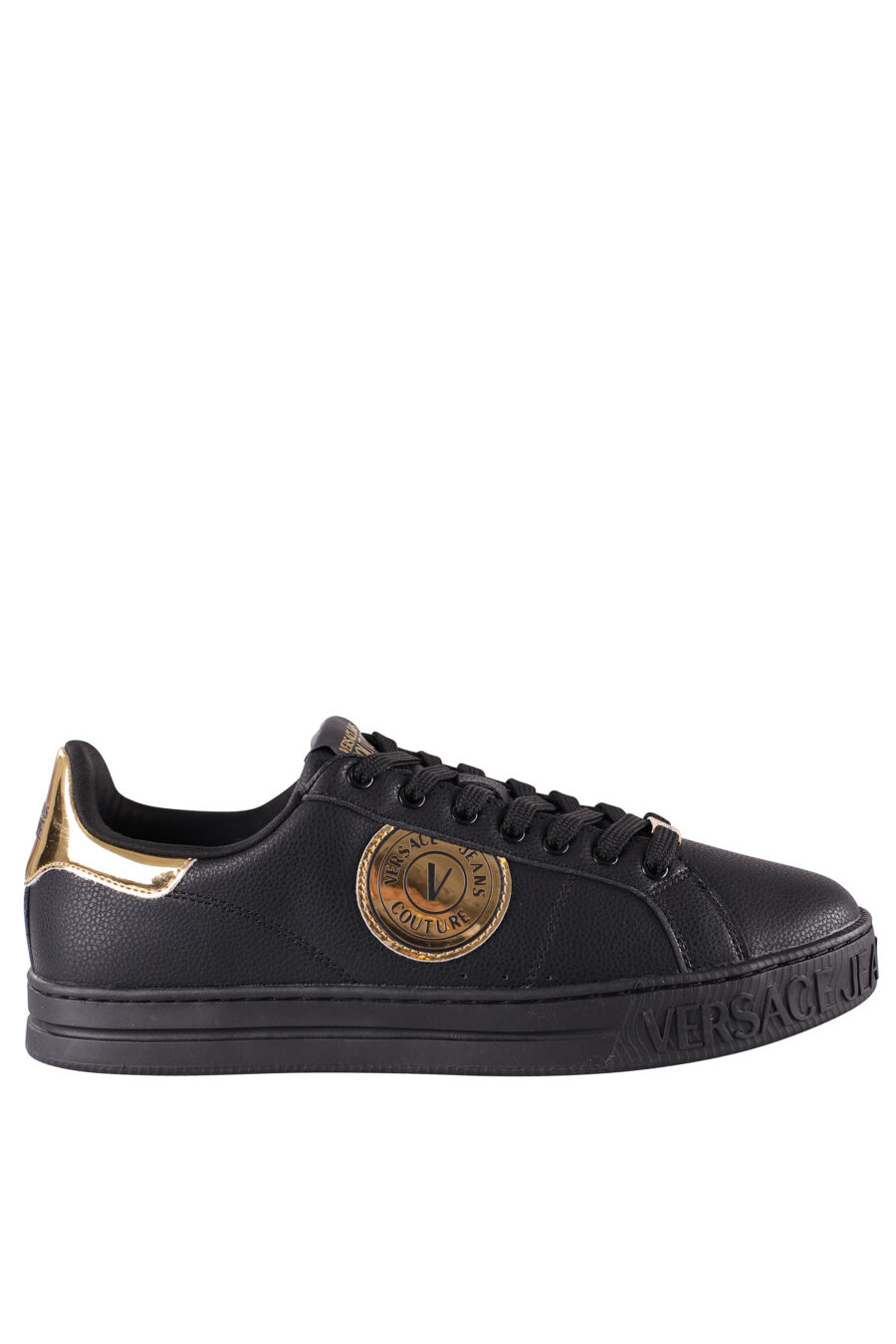 Zapatillas negras y doradas con logo semicirculo - IMG 8482
