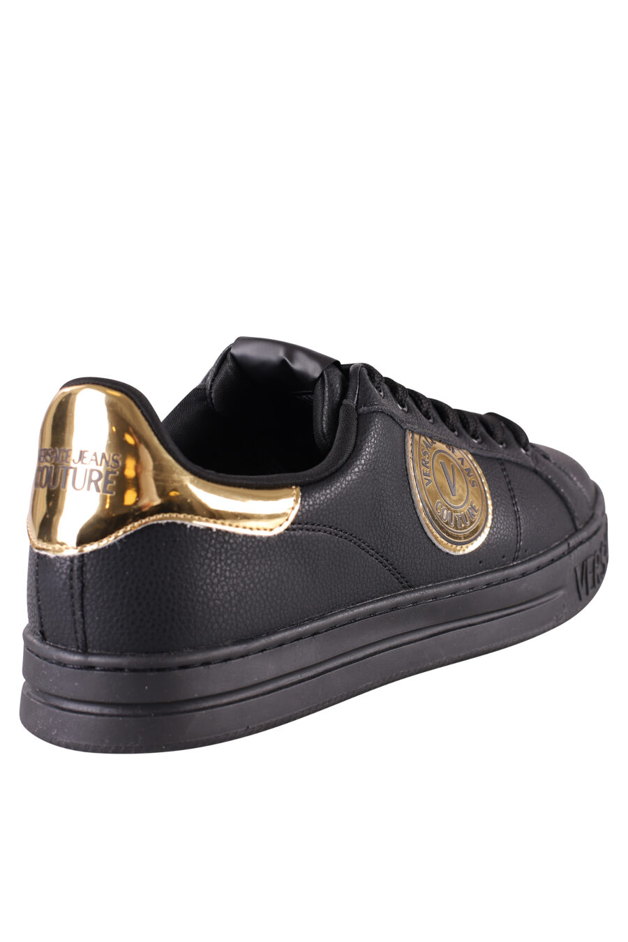 Zapatillas negras y doradas con logo semicirculo - IMG 8483