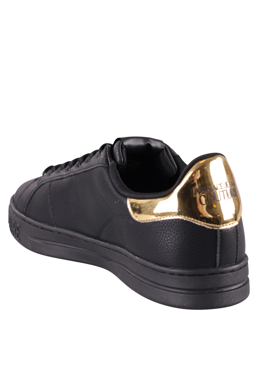 Zapatillas negras y doradas con logo semicirculo - IMG 8484