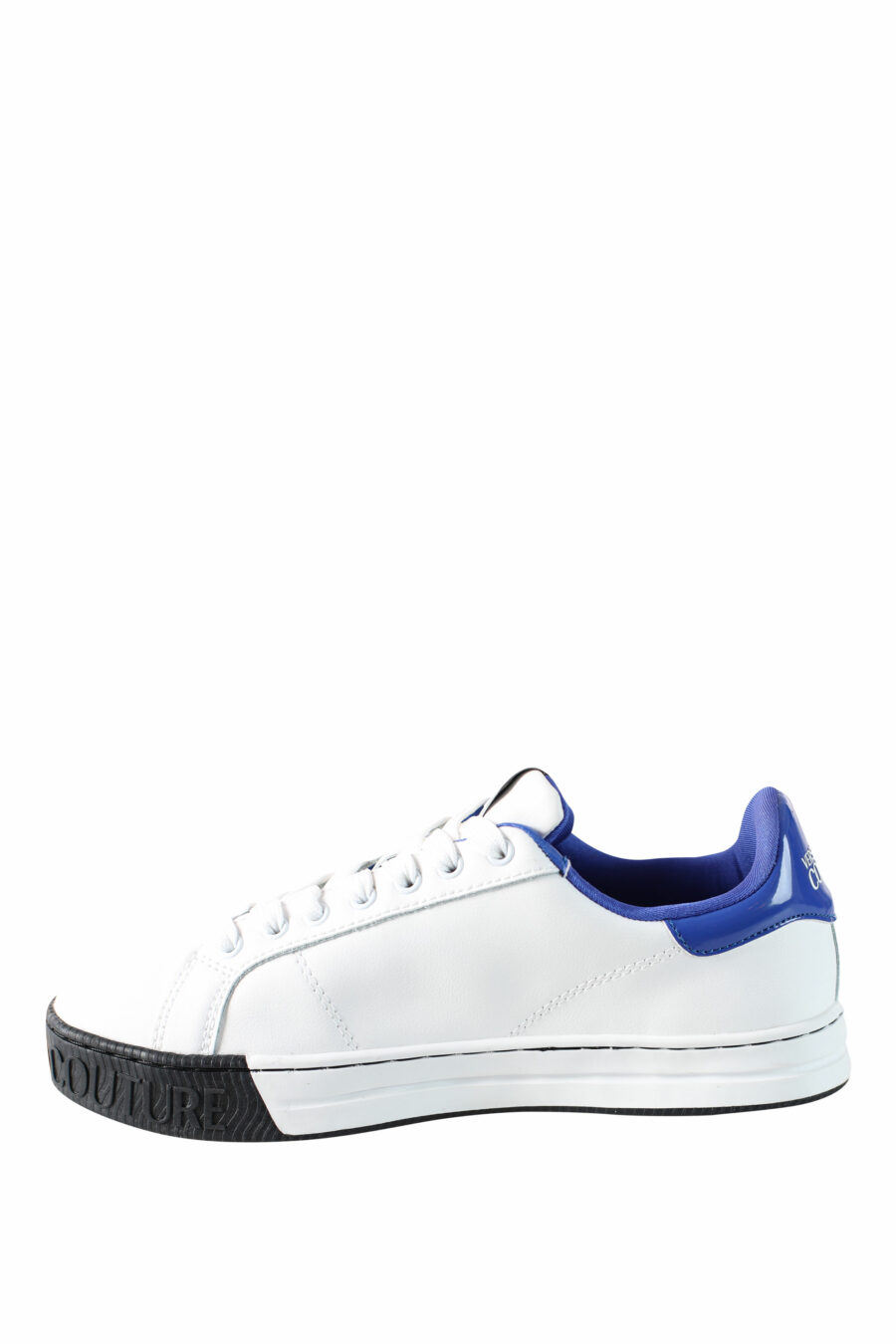Zapatillas blancas con azul y logo circular - IMG 4507