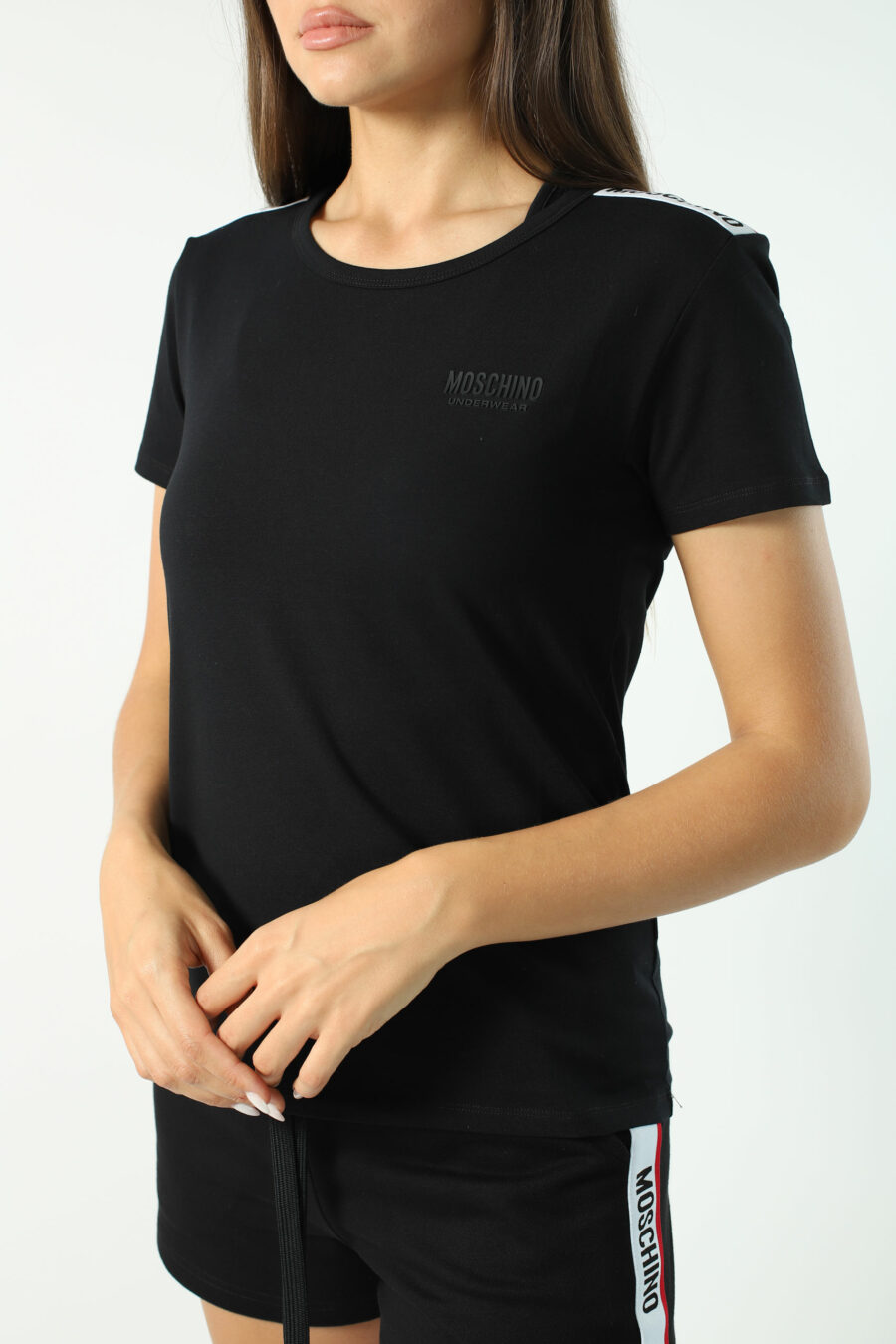 Black slim fit T-shirt with logo tape on shoulders - Photos 2900