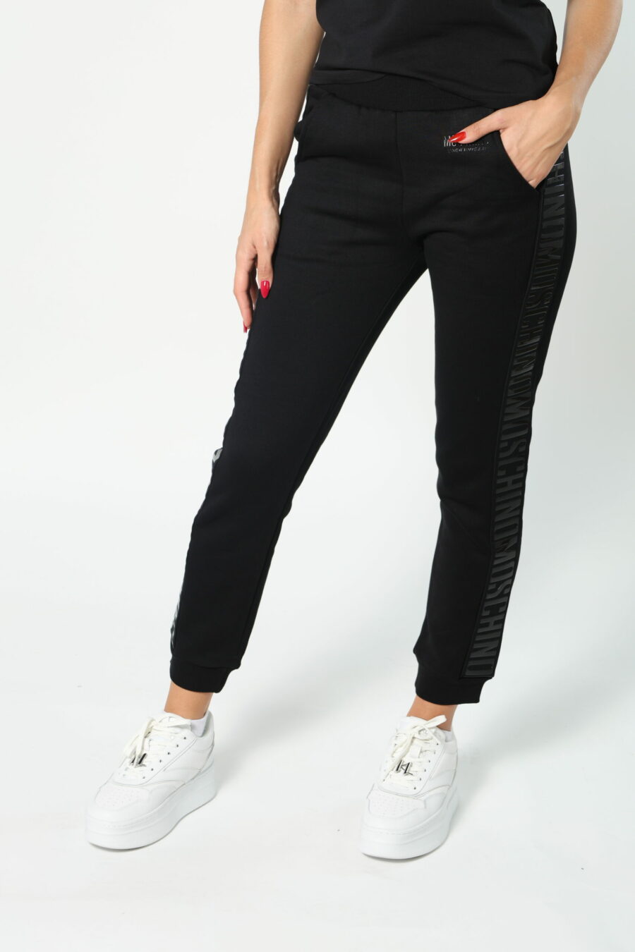 Tracksuit bottoms black with monochrome ribbon logo on sides - 8052865435499 462 scaled