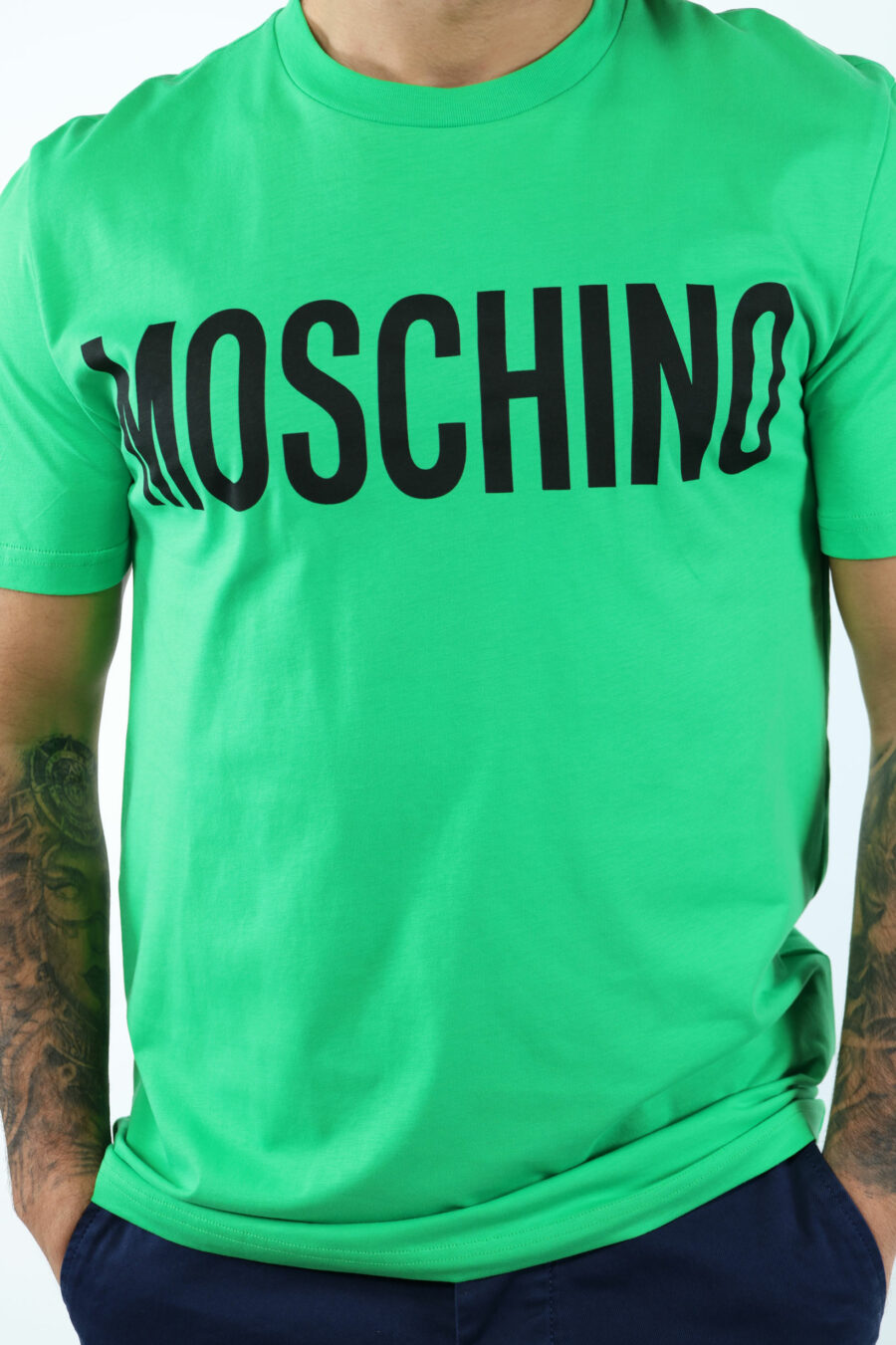 Organic cotton oversize green T-shirt with classic black maxilogue - 106716