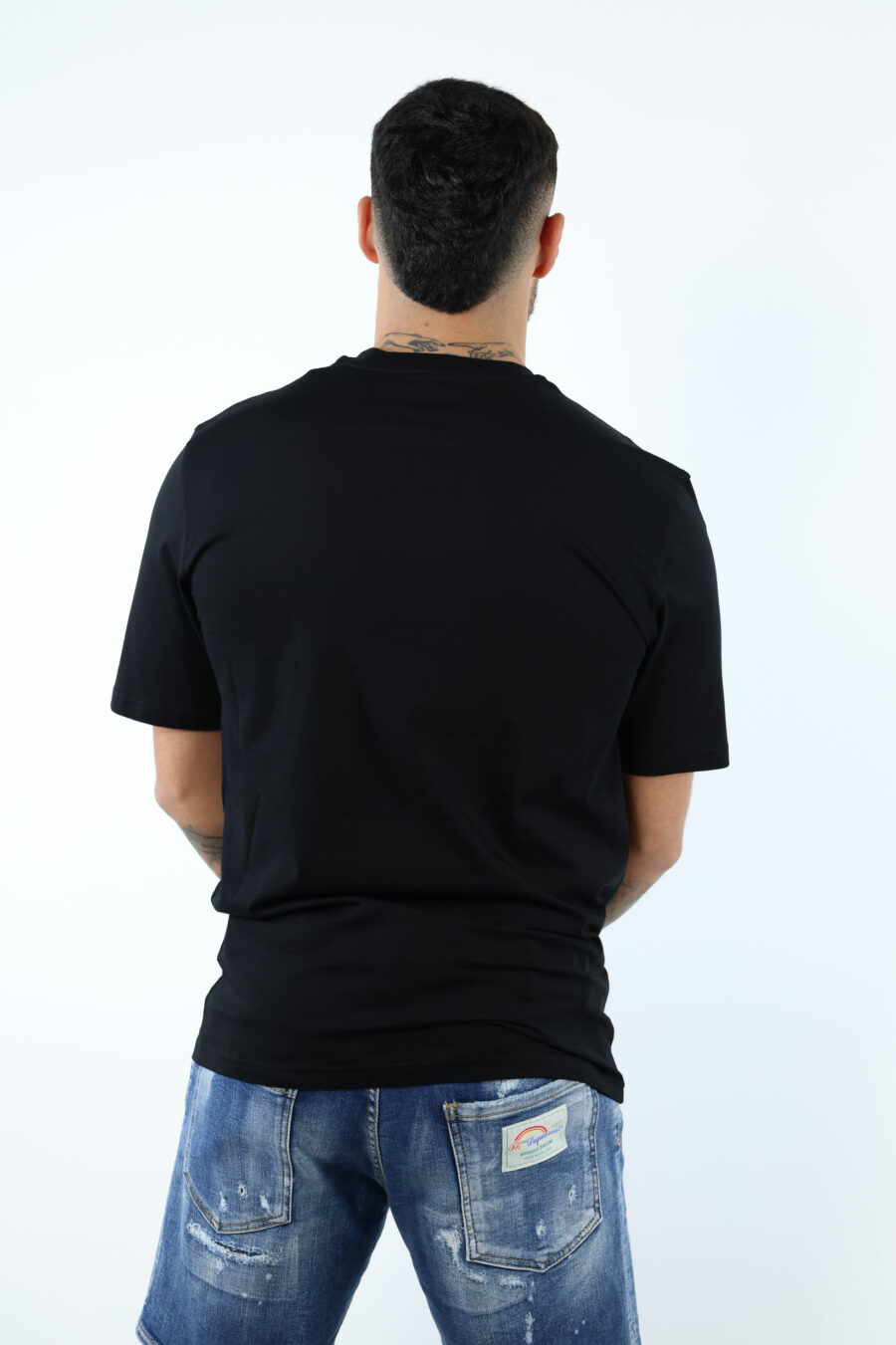 Camiseta negra de algodón orgánico "100% pure moschino" - 106944