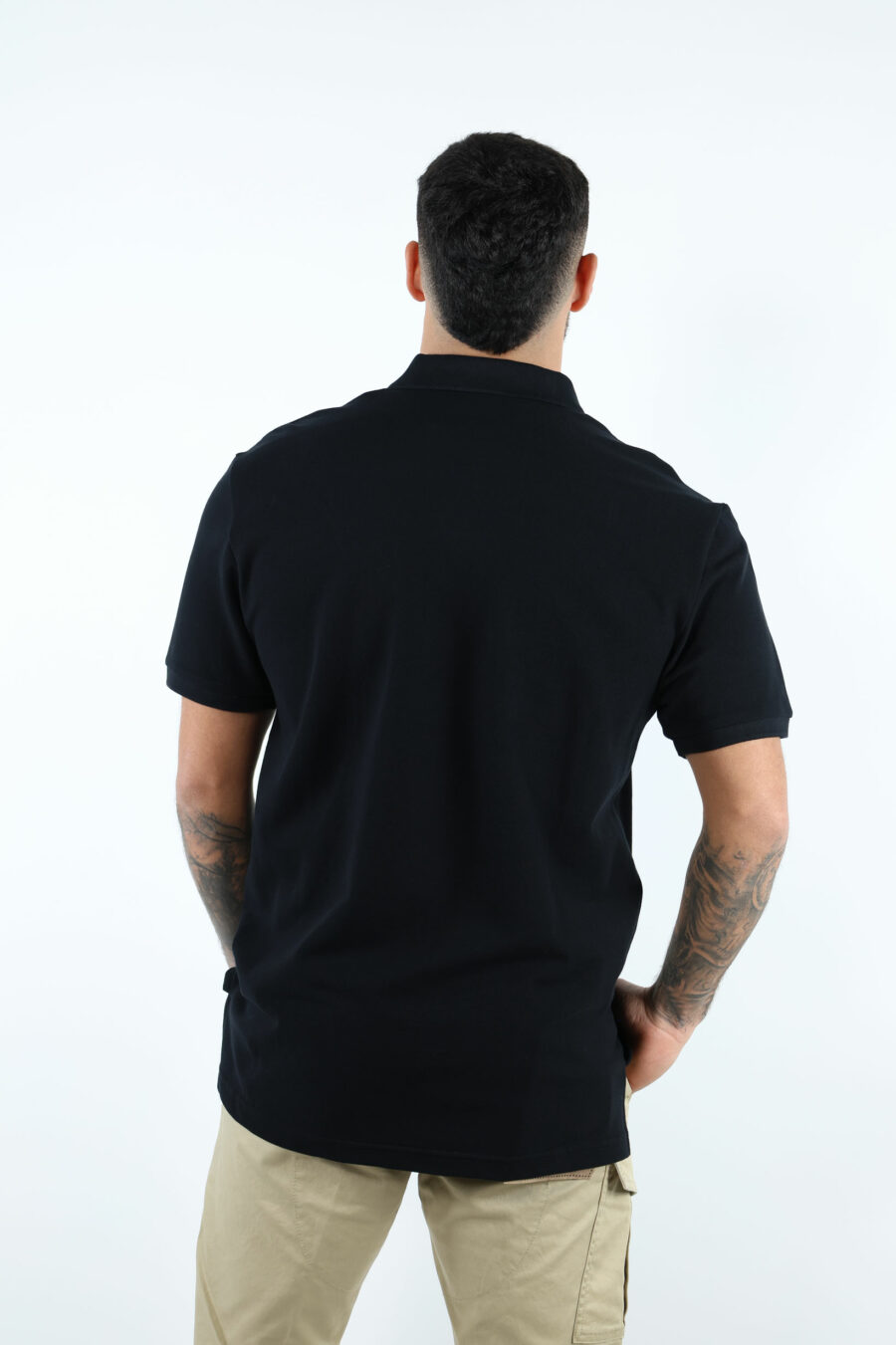 Black polo shirt with logo "in love we trust" - 106972