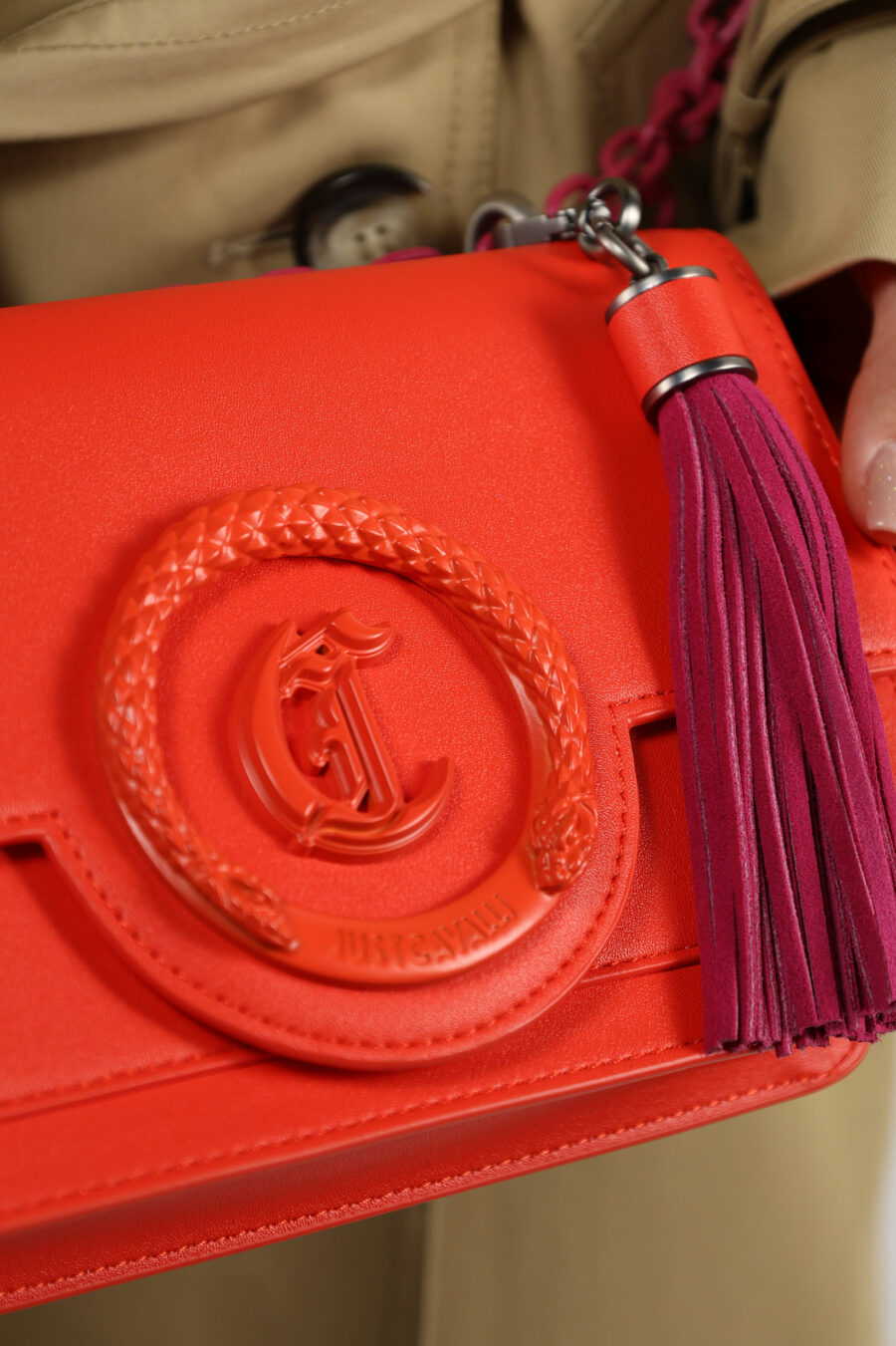 Coral coloured shoulder bag with chain and monochrome circular "c" logo - 109843