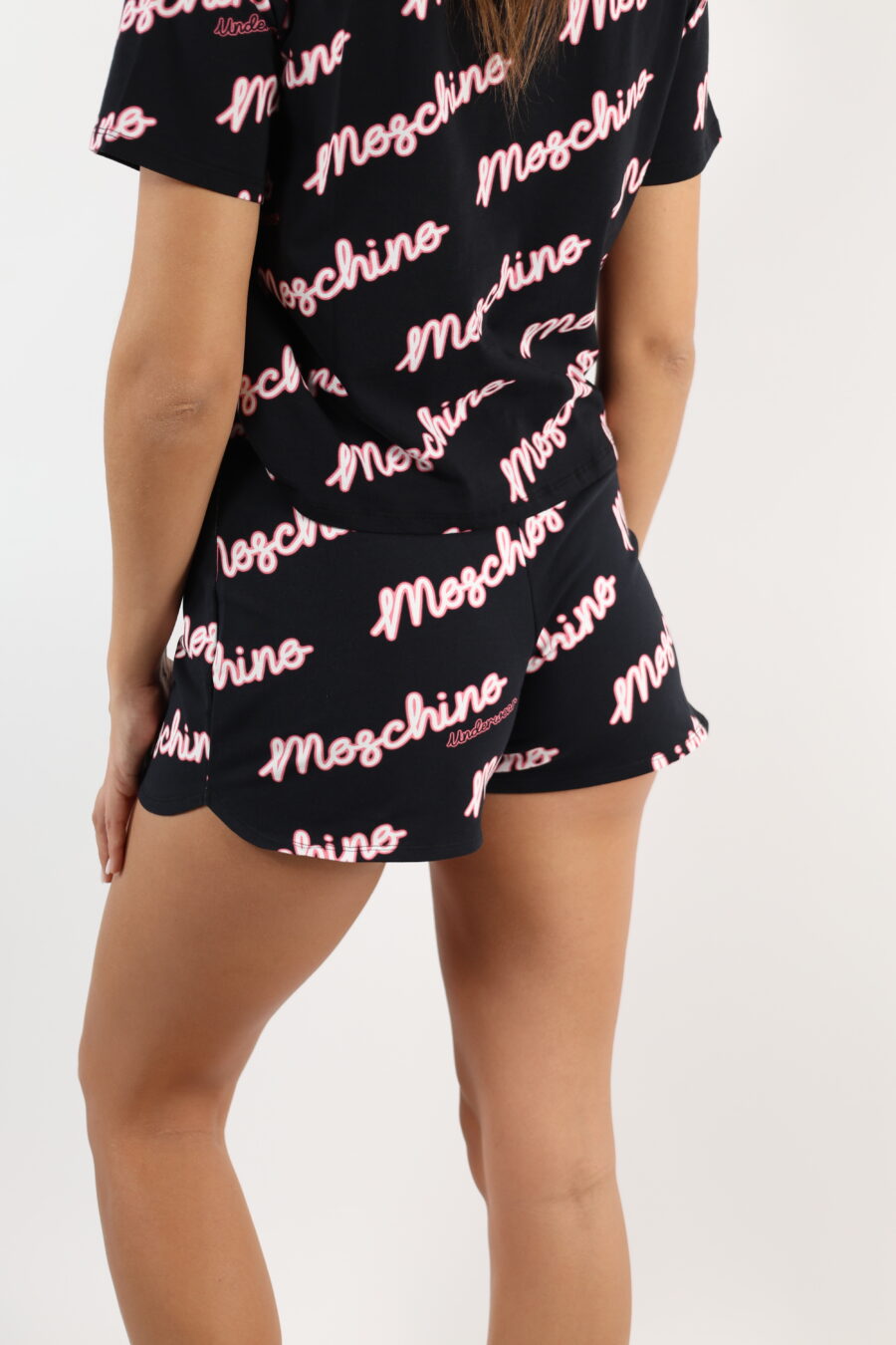 Black shorts with "all over logo moschino" fuchsia - 110574