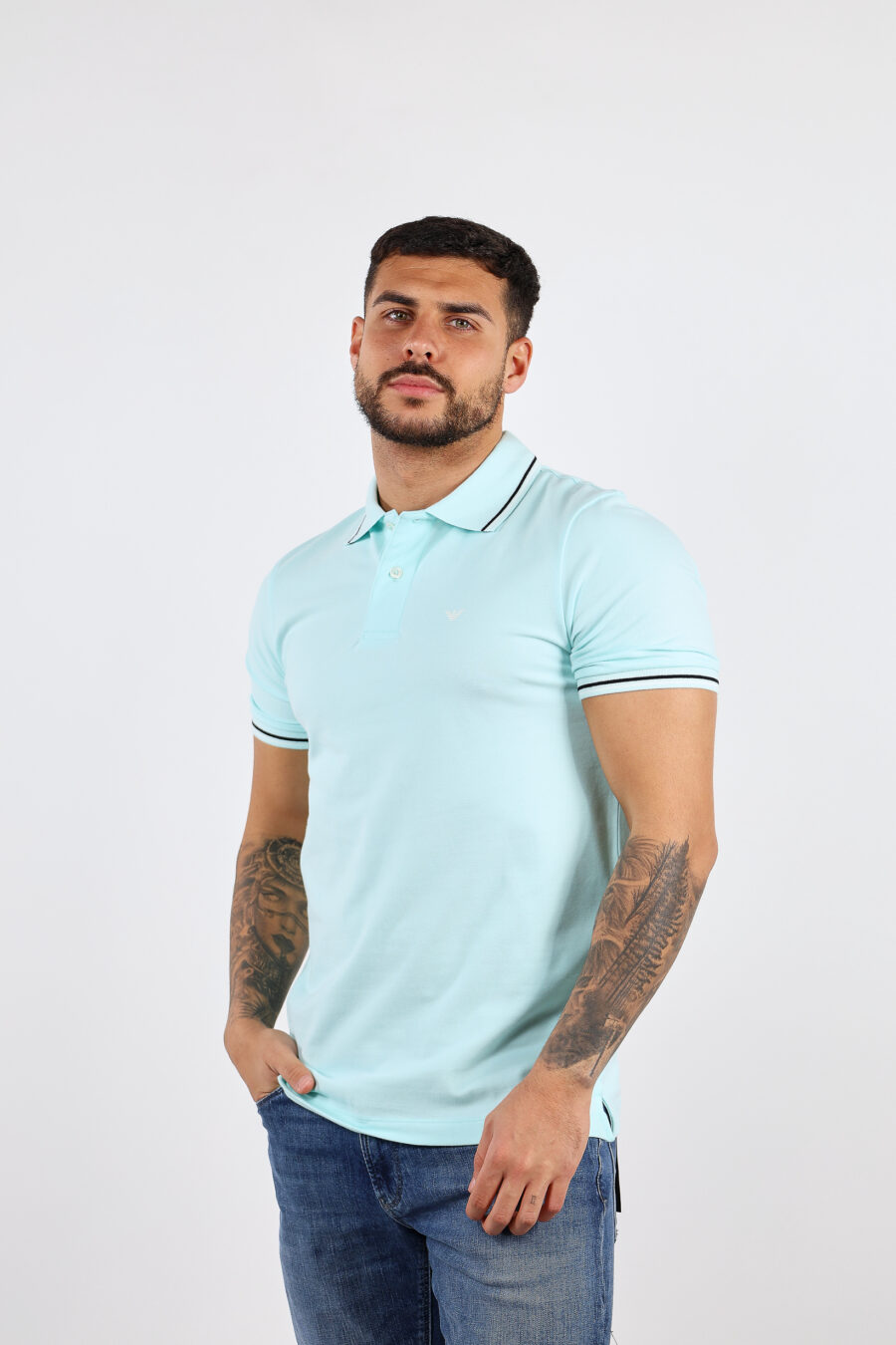 Light blue knitted polo shirt with striped collar and mini eagle logo - BLS Fashion 37