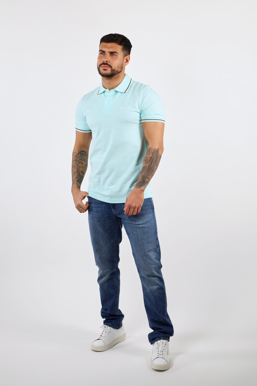 Light blue knitted polo shirt with striped collar and mini eagle logo - BLS Fashion 38