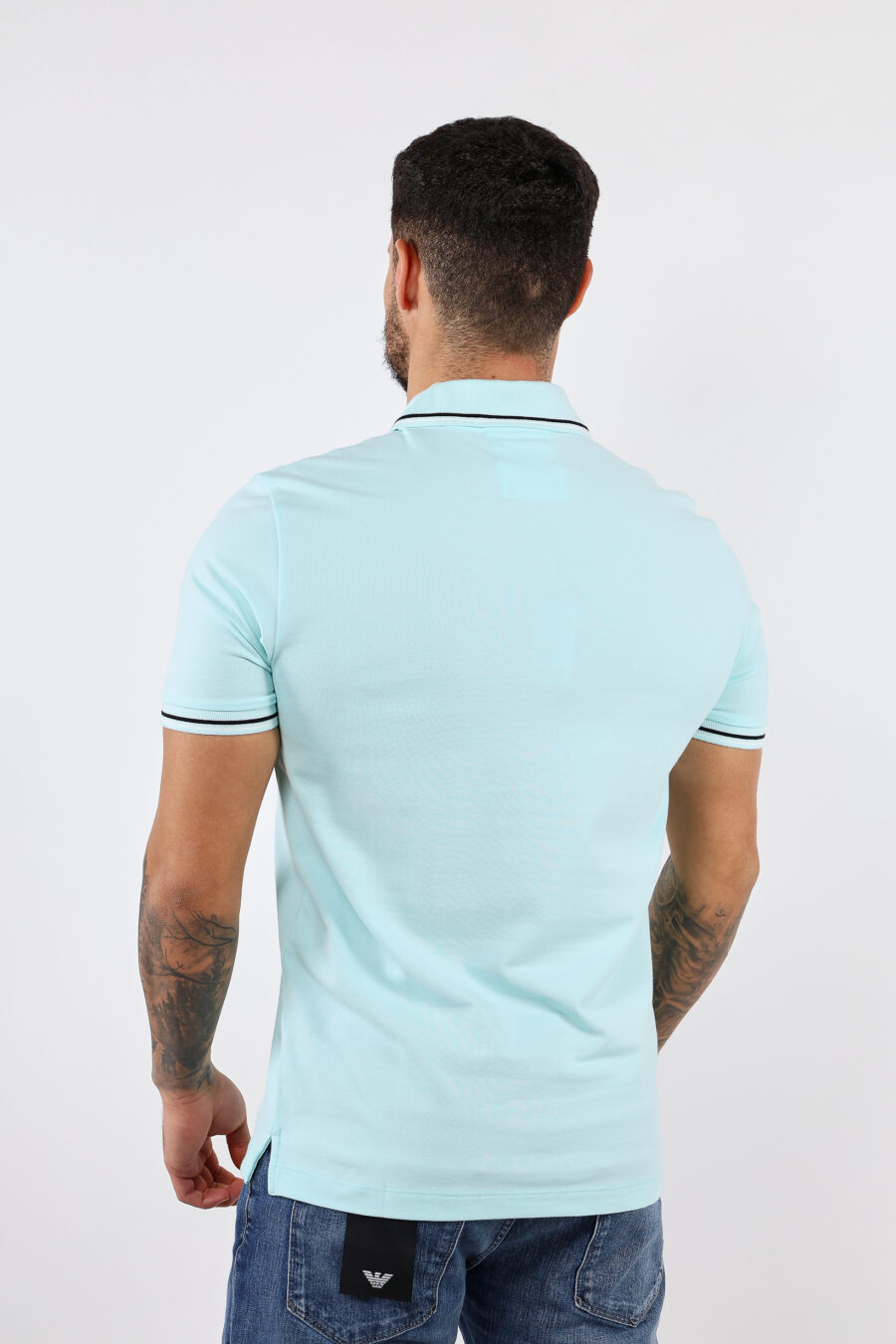 Light blue knitted polo shirt with striped collar and mini eagle logo - BLS Fashion 40