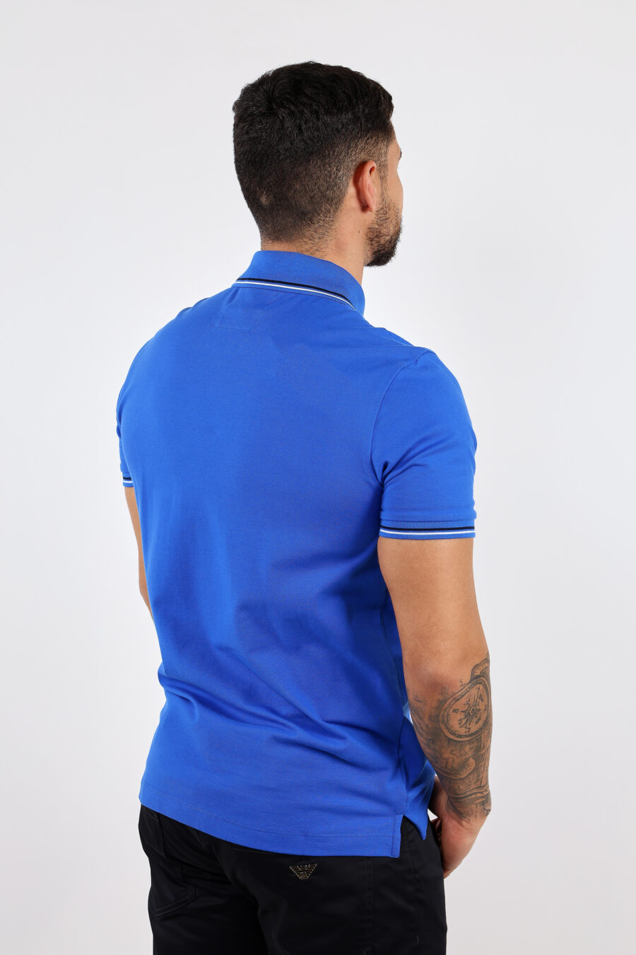 Blue knitted polo shirt with striped collar and mini eagle logo - BLS Fashion 58